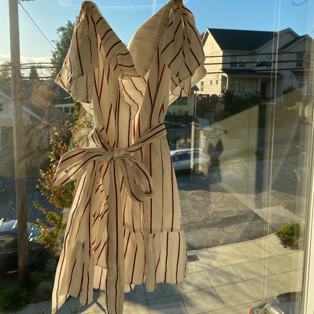 Sabo Skirt | white off-the-shoulder dress | red vertical straps